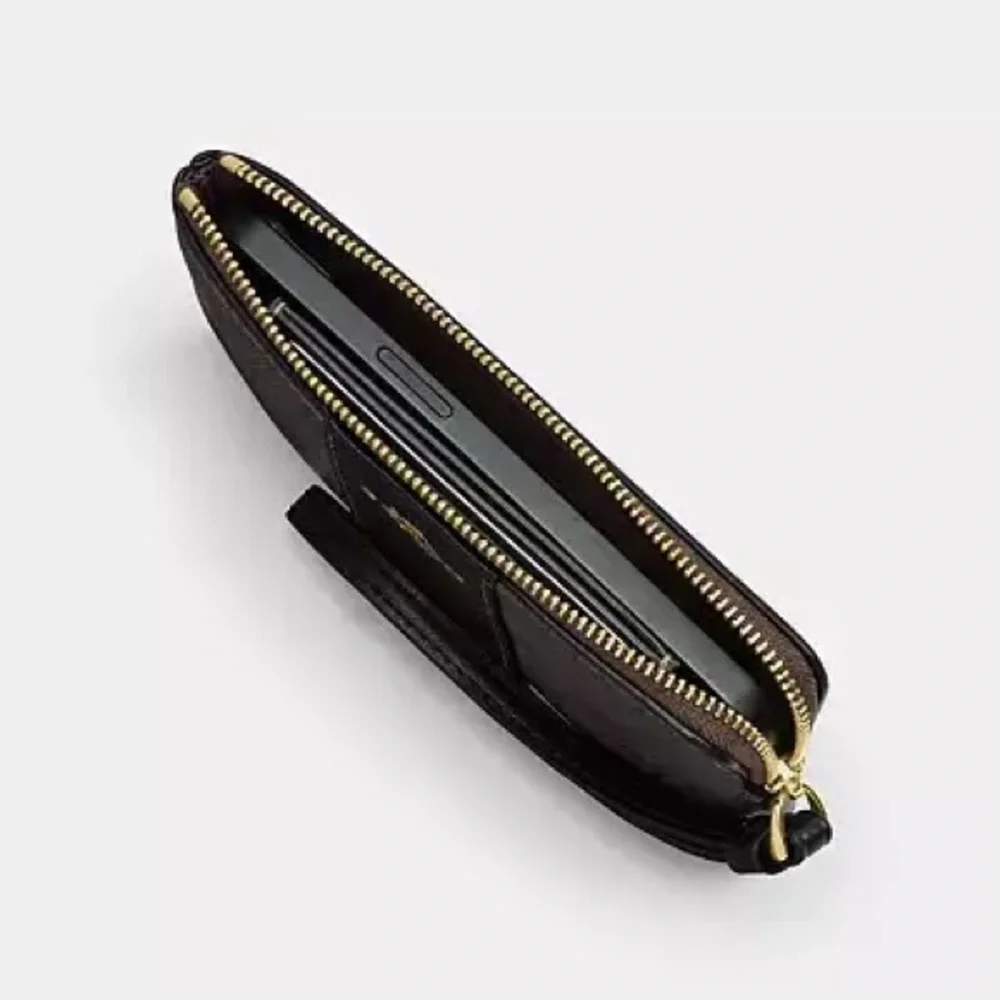 Coach Star Black and Silver Wristlet NWT